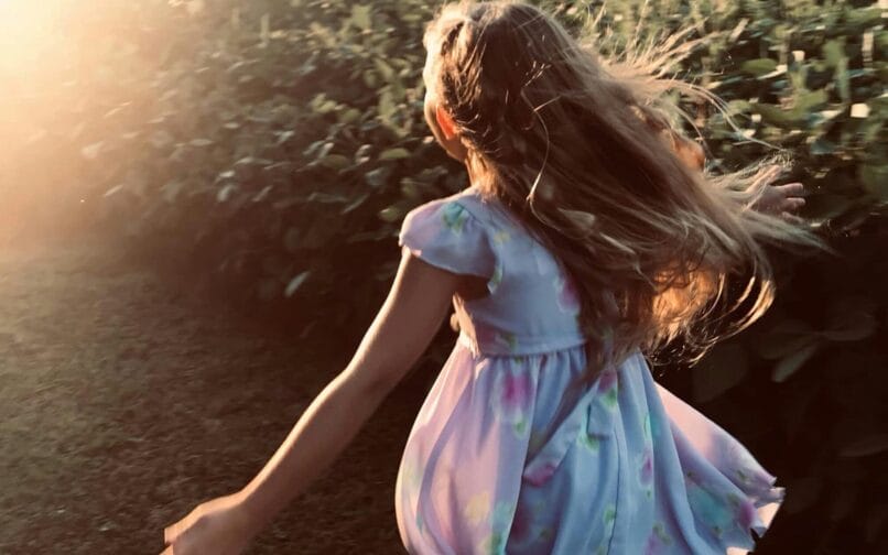 girl running in the field (banner)